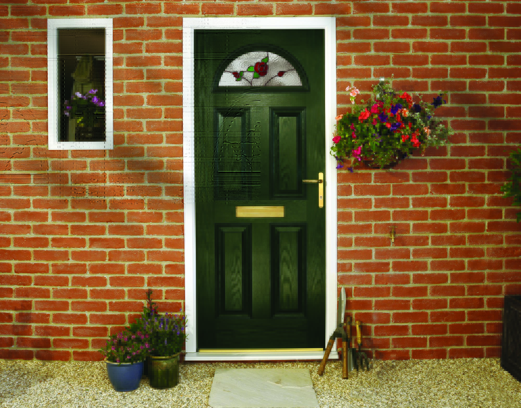 Black Composite door with stained glass roses on the top.