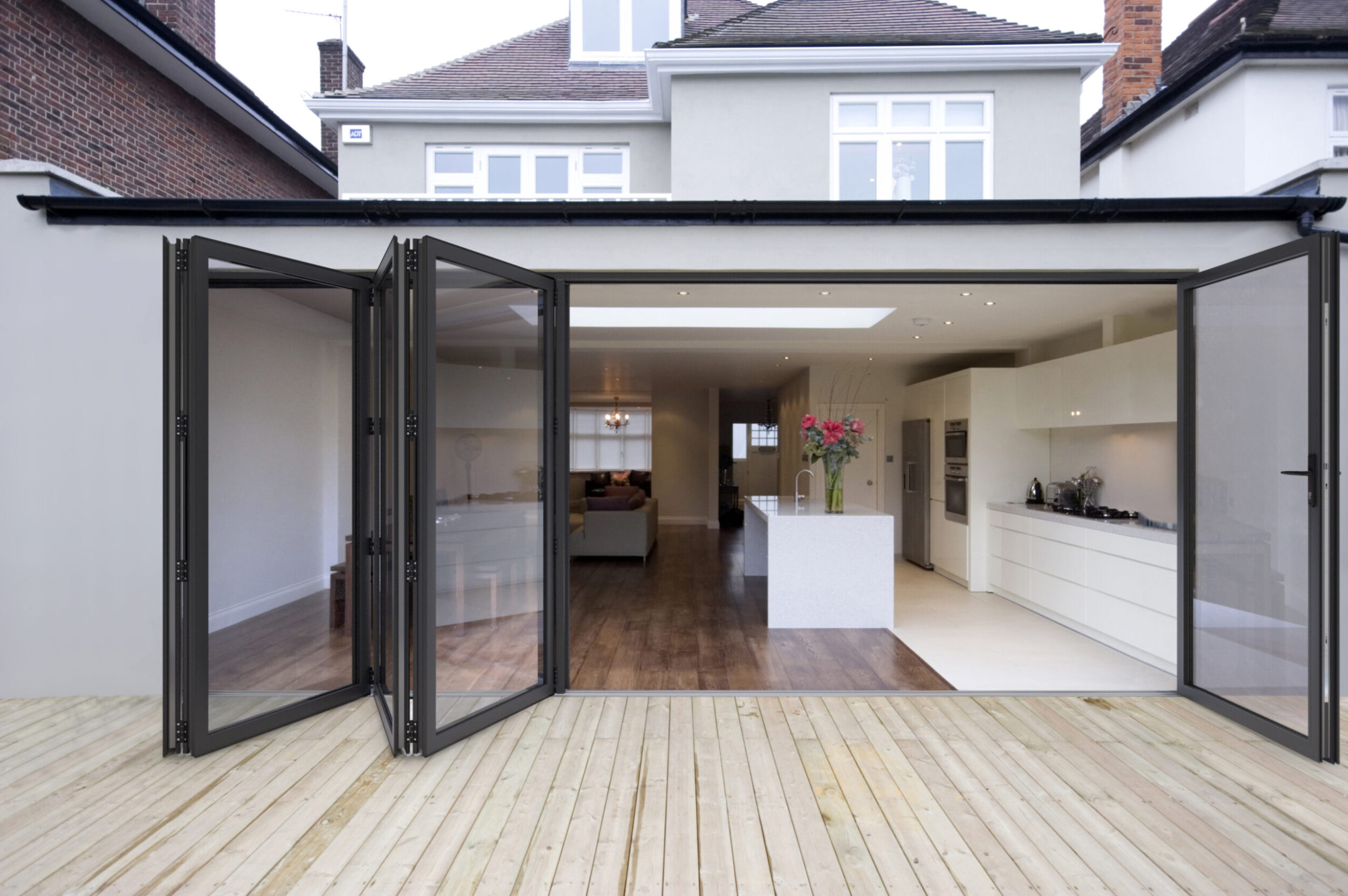 bi-folding doors open leading into kitchen